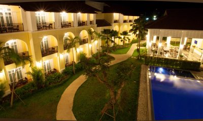 The pool lit at evening